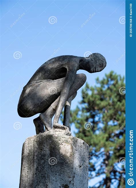 Modern Sculpture Of A Squatting Man Editorial Stock Photo Image Of