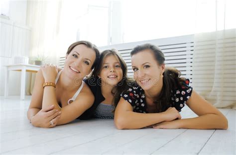 Mature Sisters Twins At Home With Little Daughter Stock Image Image Of Human 3540 34141213