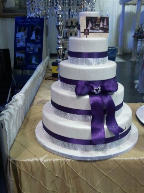 What kind of flowers are in a purple bouquet? MY SPARKLY PURPLE WEDDING CAKE | Weddingbee Photo Gallery