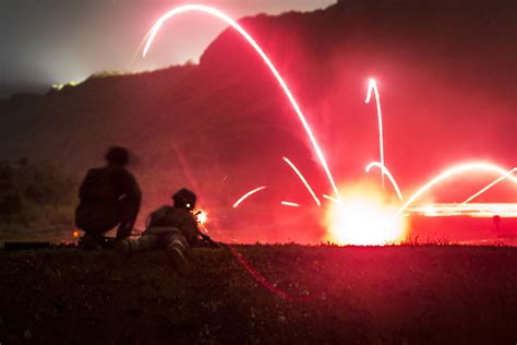 15 Fiery Photos Of Tracer Bullets Lighting Up The Sky