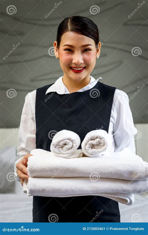 Room Service Maid Cleaning And Making Bed Hotel Room Concept Portrait Of Young Beautiful Asian