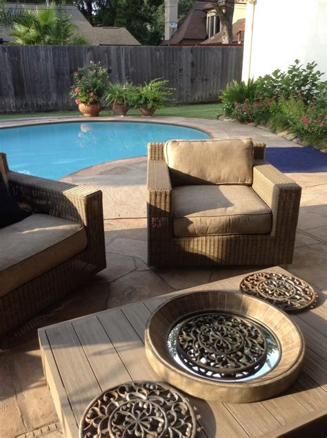 Wrought iron is also a material that can withstand a hot, humid climate with minimal upkeep. Houston patio makeover with upscale outdoor furniture ...