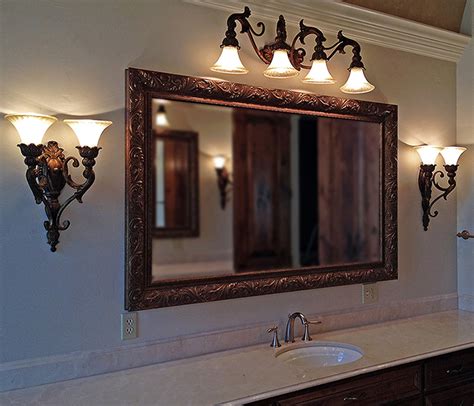 One way to customize your one way to customize your bathroom, no matter the style or size, is to install an oversized vanity mirror and mount a bathroom lighting fixture on top. Framed Mirrors - Buy Custom Mirrors | Texas Custom Mirror