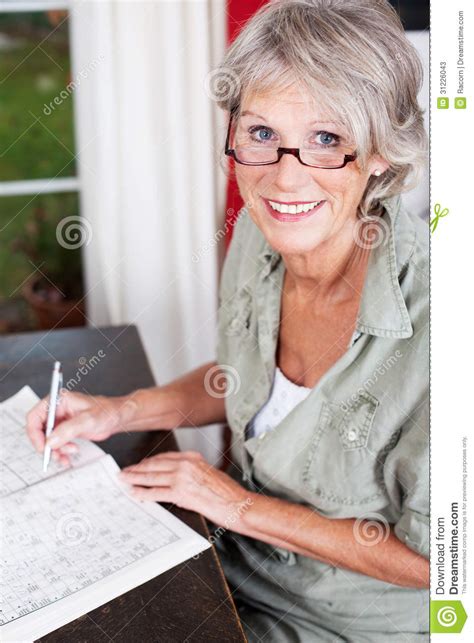 Older Woman Wearing Glasses Working Stock Image Image Of