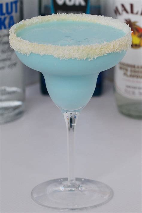 Blue Coconut Rum Cocktail Malibu Vodka And Blue Curacao Recipe Coconut Rum Cocktail