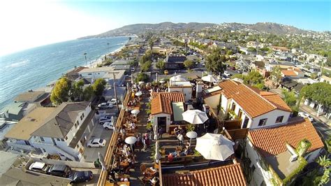 Indulge in one of the best happy hours in town, with signature fresh fruit mojitos and one truly amazing panoramic ocean view. The Rooftop Lounge at Casa del Camino, Laguna Beach - YouTube