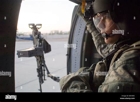 Uh 60 Black Hawk Door Gunner Prepares For Liftoff From Lz Washington In