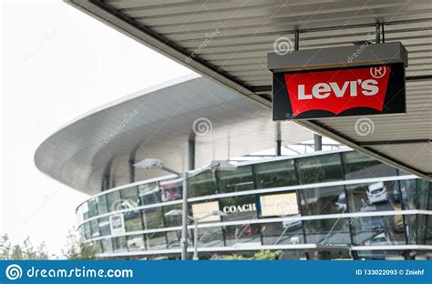 The manager stated that he did everything to keep the player before he left for the german club at that time, but de bruyne's mind was made up. The Levis Logo On The Ceiling In Front Of A Store In An ...