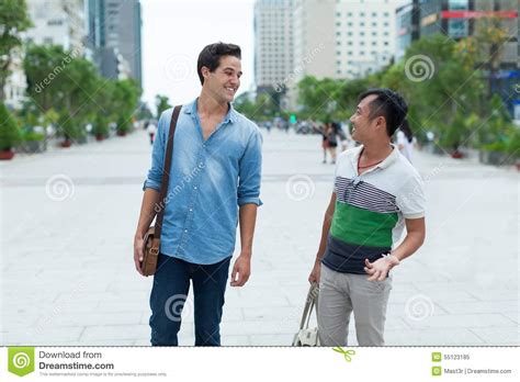 Two Men Smile Talking Outdoor Asian Mix Race Stock Image Image Of