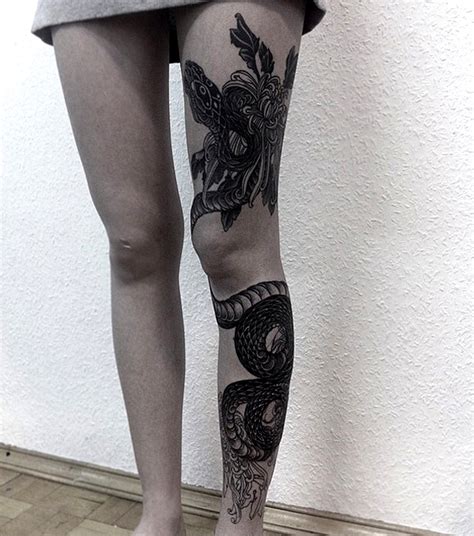 Black snake tattoo on the leg. 28+ Snake Tattoos On Leg