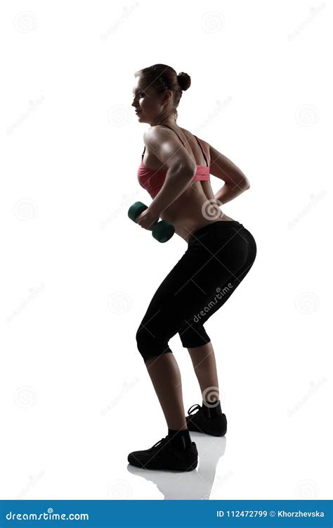 Sport Young Athletic Woman Doing Squatting With Dumbbells Silho Stock