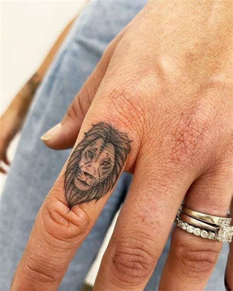 Lion Tattoo On The Finger