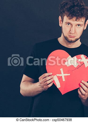 Separation And Conflict Young Upset Sad Man With Red Heart Glued By