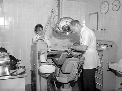 dentist working patient october 18 1962 black photograph by mark goebel pixels