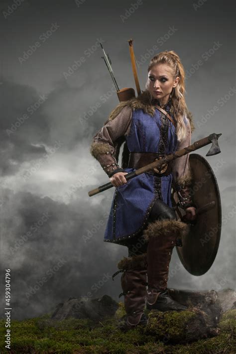 Beautiful Female Viking Woman Warrior In Battle With Ax And Bow With