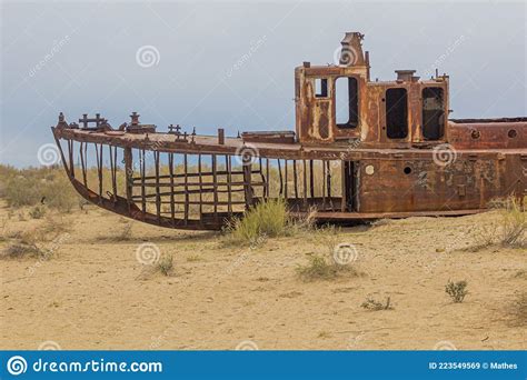 Rusty Abandoned Ship At The Ship Cemetery At The Former Aral Sea Coast