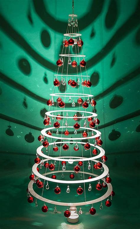 I love the book pile christmas tree too. 40+ Unique Christmas Tree Alternatives | Art & Home | Diy ...