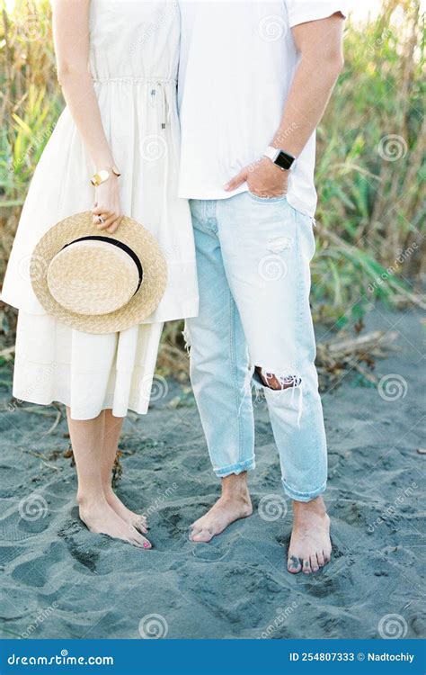 Man And Woman Stand Next To Each Other Barefoot On The Sand Stock Image Image Of Love Close