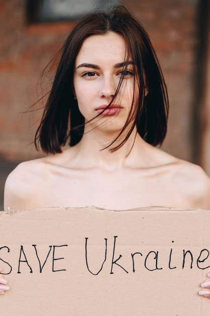 Premium Photo Closeup Portrait Of Nude Woman With Poster Save Ukraine Woman With A Belligerent