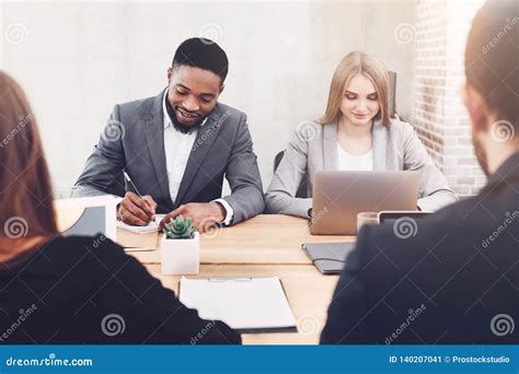 Diverse Business People Working Together In Office Stock Image Image