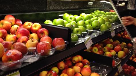 Your local big lots in apple valley, ca carries everything you need at affordable prices. Woman Selecting Fresh Green Apples In Grocery Store ...