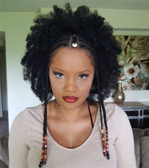 If you're considering braids for your afro hair, follow our aftercare, and maintenance advice for to keep them frizz free and intact for longer. 10 Inspirational Photos of Braids with Beads and Cowrie Shells