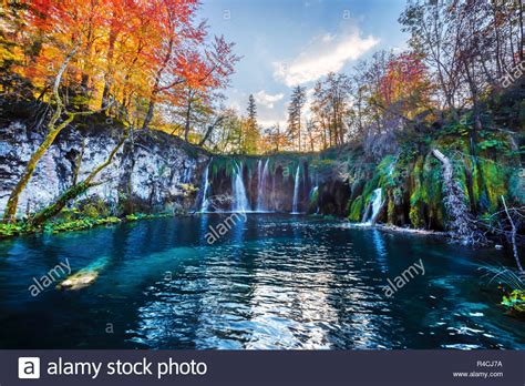 Amazing Waterfall With Pure Blue Water In Plitvice Lakes Orange Autumn