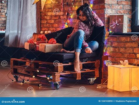 Brunette Female In A Room With Christmas Decoration Stock Photo Image Of Festive Girl