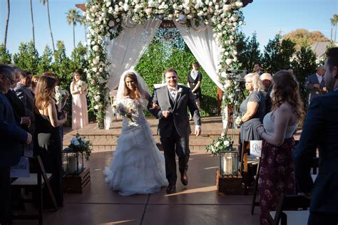 Bride And Groom Exiting Their Courtyard Wedding Ceremony Arizona