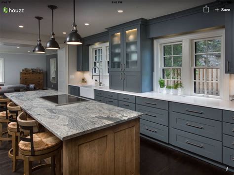 They add both form and functional appeal by breaking up the monotony of repetitive cabinet fronts, allowing you to proudly. Gray kitchen cabinets, frosted glass cabinet, counter with ...