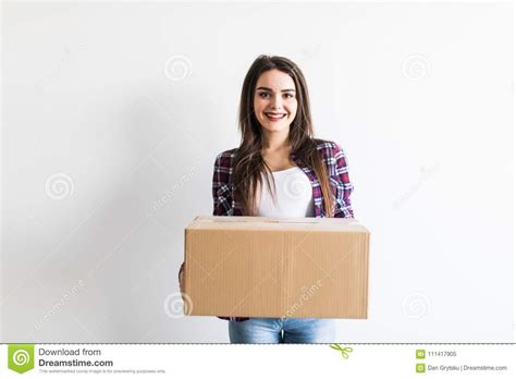 Woman Carrying Moving Boxes Young Woman Moving House To New Home