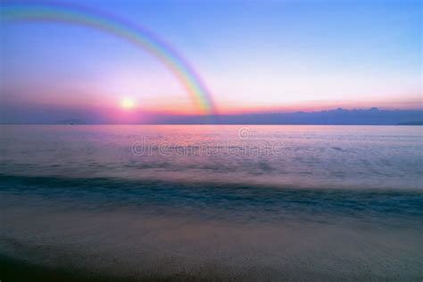 Sky Sunset And Ocean Beach With Rainbow Stock Image Image Of Cloud