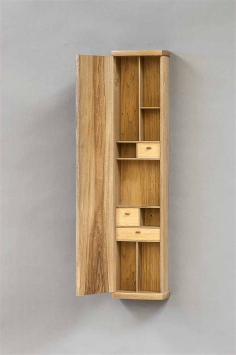 The dark brown color makes the piece more sophisticated and classier than other types of hanging file cabinets. Wall Hanging Cabinet « The Krenov School of Fine Furniture ...