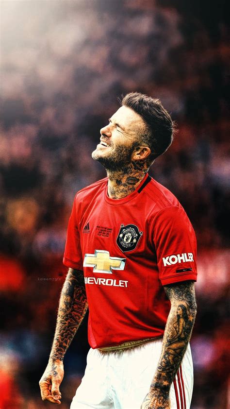 Download David Beckham During A Match In Old Trafford While Playing For