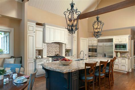 Often, vaulted ceilings will have exposed beams as part of their architecture, giving an even more striking look. Traditional Kitchen with Vaulted Ceiling and Faux Wood ...