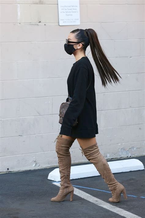 Ariana Grande In A Black Dress And Knee Beige Boots Beverly Hills 11 14 2020 • Celebmafia