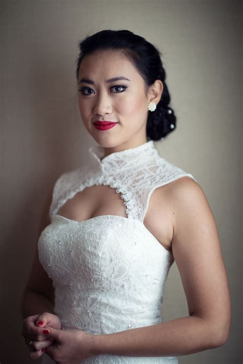 The Bride S High Neck Chinese Wedding Dress Updo And Red Lipstick