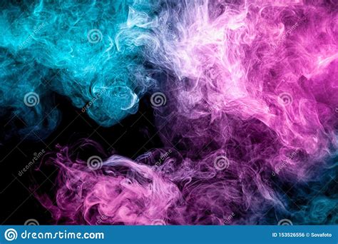 Abstract Art Colored Blue And Pink Smoke On Black Isolated Background
