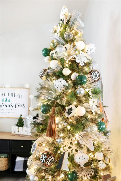 In fact, on christmas eve, you decorate the whole house for a fuzz of festivity and #2 white christmas tree with white and purple lights and purple ribbon. Black & White Modern Snowflake Christmas Tree Decor