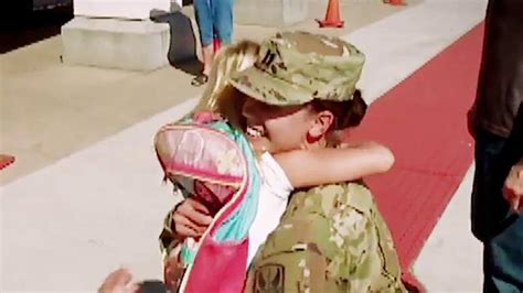 Army Captain Surprises Daughters At School After Serving In Iraq For
