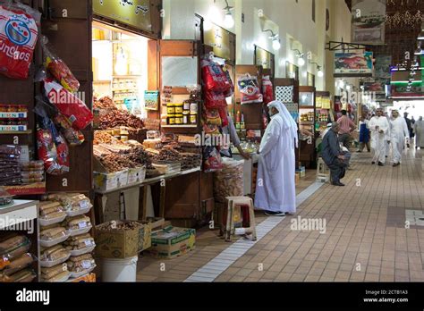 A Man In Dishdasha Shopping At The Market In Souq Mubarakiya Kuwait
