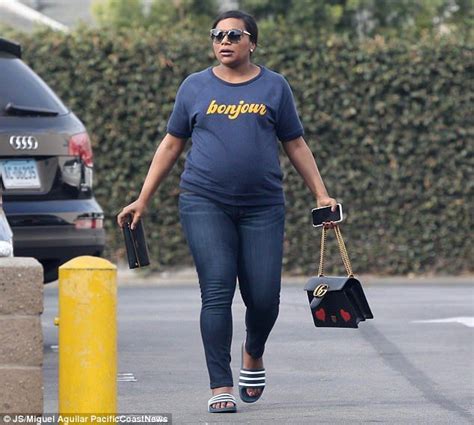 Pregnant Mindy Kaling Shows Off Her Baby Bump In A Statement Tee