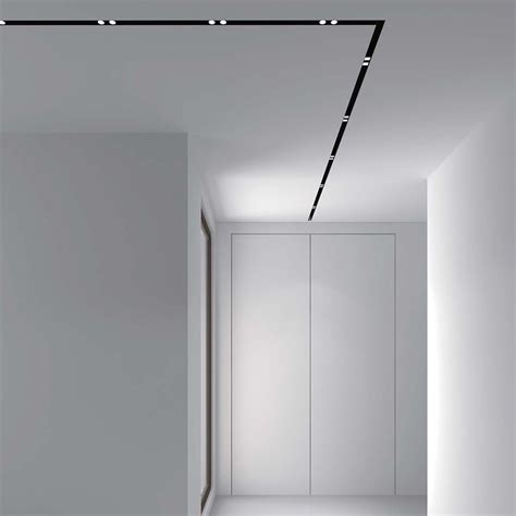 Track lighting is a method of lighting where light fixtures are attached anywhere on a continuous track device which contains electrical conductors. DLD Shadowline Recessed Track - Next Day Delivery ...