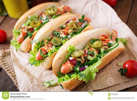 Hot Dog With Jalapeno Peppers Tomato Cucumber And Lettuce Stock Photo
