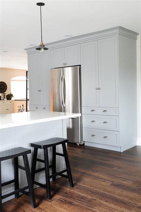 Kitchen with light grey cabinets. Gray Cabinets in Farmhouse Kitchen | HGTV