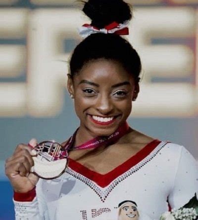 Simone's pretty amazing but given her height of 4′8″ i'm not sure she could dunk a basketball in the traditional sense of just jumping up (even from a run). Simone Biles Height Weight Age Biography