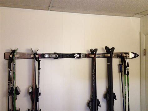 Homemade Wall Mounted Ski Rack Storage Created From An Old Ski Can