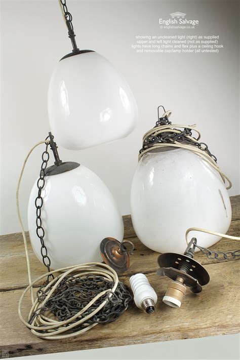 I have always liked the way a ceiling fan cools a room but not to keen on their appearance. Vintage Opaline Globe Pendant Ceiling Light