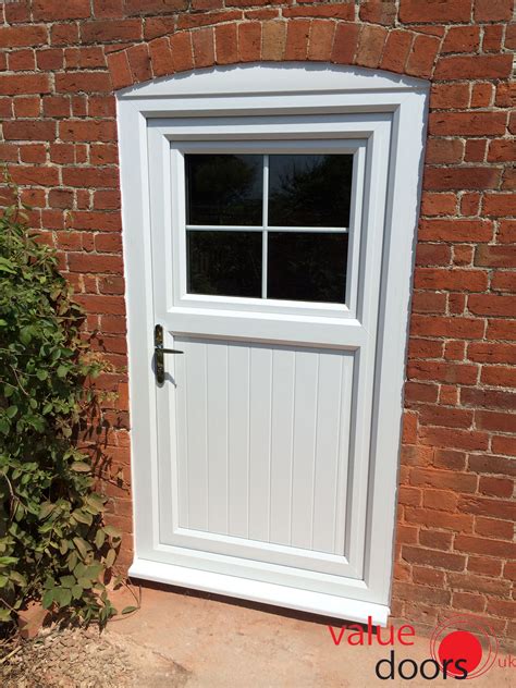 Our custom white upvc sliding patio door set have an average rating of 4.9 out of 5.0 based on 14 independent reviews. A uPVC Stable Doors in White with Georgian bar! | Upvc ...