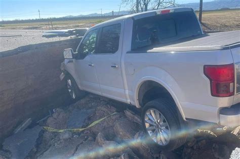 Giant Sinkhole Swallows Truck As Drivers Keep Ignoring